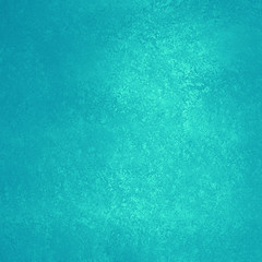 light blue background with faint sponged vintage texture and soft yellow lighting