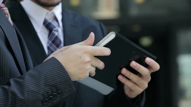 businessmen with tablet computer