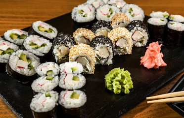 Sushi combo dish with wasabi and ginger