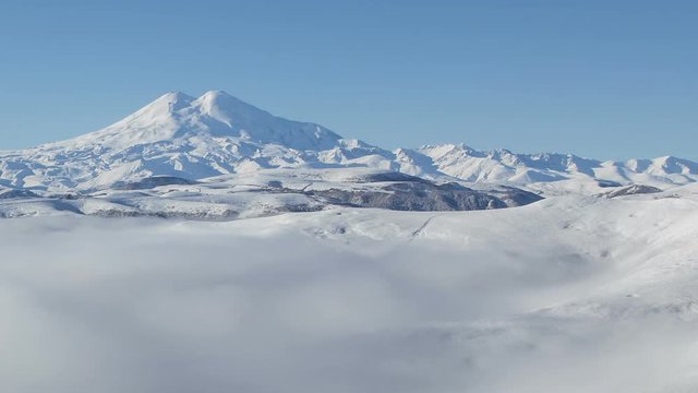 Russia, timelapse. The formation and movements of clouds up to the steep slopes of the  mountains of Central Caucasus peaks.