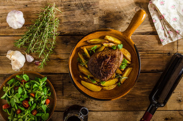 Beef steak with herbs and wine