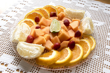 fresh fruit salad on a light background; 