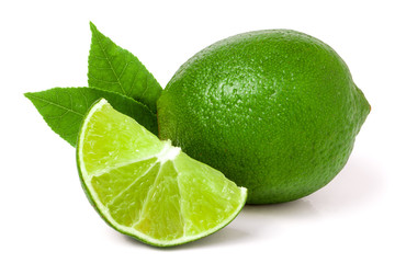 lime with slices and leaf isolated on white background