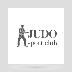 Judo sport club logo design with grey silhouette of man. Vector illustration