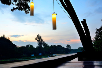 Beautiful nature and  lamp light.