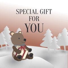 A Bear Holding a Christmas present in Snowy Forest With Texts Special Gift For You