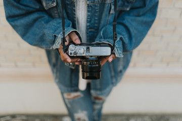 Close up of woman adjusting camera