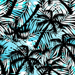 Naklejka premium Tropical blue and black palms seamless pattern