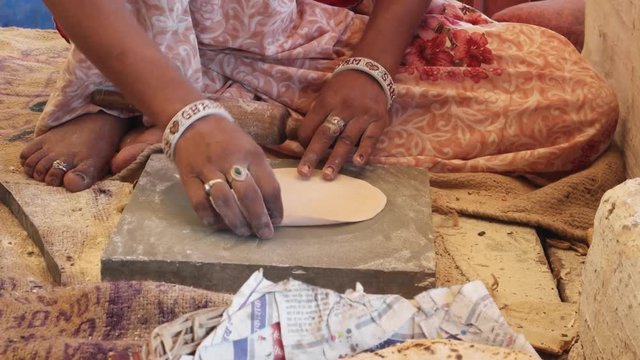 Indian food and sweets cooking, preparation, werving at a Dhaba- a traditional highway restaurant in India and South-East Asian sub-continent, mostly in non-urban areas 