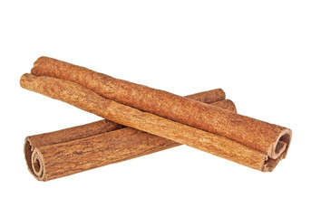 Two cinnamon sticks isolated on white background