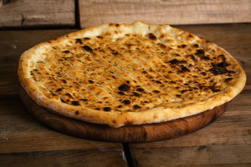 Garlic pizza bread on wood table 