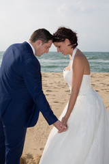 loving couple on the sea beach wedding day and love