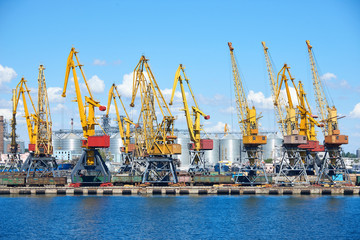 Fototapeta na wymiar industrial sea port and cranes, railways, warehouses