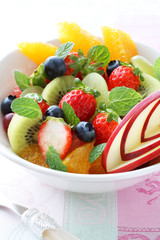 フレッシュフルーツサラダ,A bowl of healthy fresh fruit salad with carved from apple