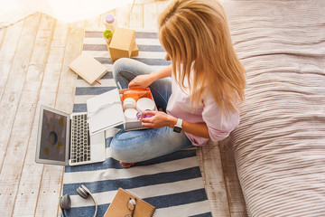 Cheerful woman prefers online shopping