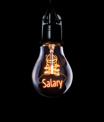 Hanging lightbulb with glowing Salary concept.