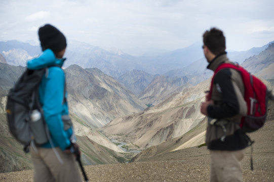 Stopping to savour the views from the top of the Konze La, 4900m, during the Hidden Valleys trek, Ladakh