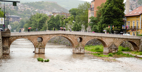 The Latin Bridge, Sarajevo, Bosnia and Herzegovina. Bridge close by place where Princip assassinated the Austro-Hungarian heir to the throne, Franz Ferdinand, prompting the outbreak of the World War I - obrazy, fototapety, plakaty