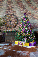 Merry christmas and new year background. Classic green tree decorated with presents under