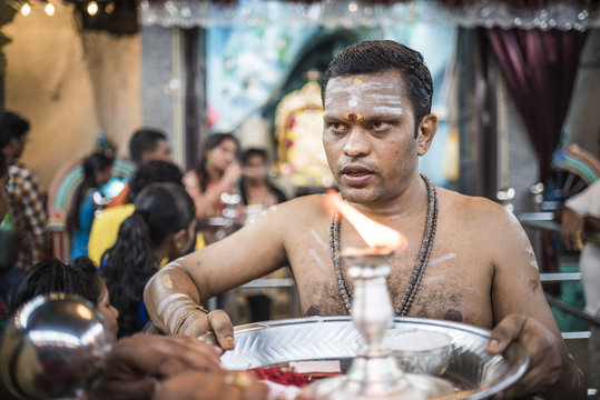 Hindus worshipping and praying at Batu Caves, Kuala Lumpur, Malaysia