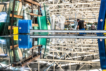 Cutting Glass automated machine for glass panels for PVC Windows and Doors manufacturing, tempered float glass panels.