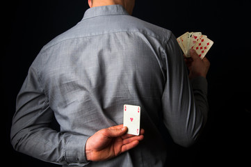 Man cheating at cards