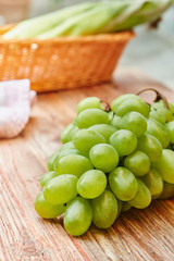 Grapes on wooden table