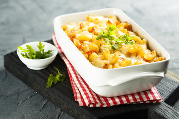 Pasta bake with tomato sauce and mozzarella cheese