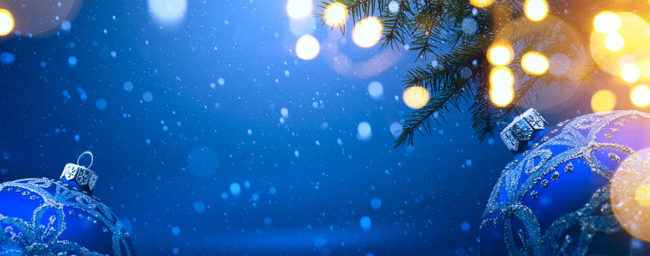 Art Christmas Decoration On Blue Snow Background