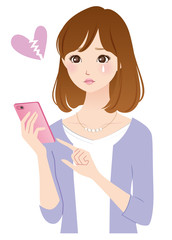 スマホを見る若い女性