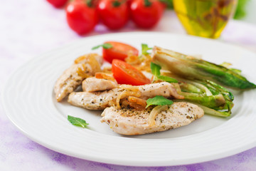 Baked chicory with chicken, onions and herbs.