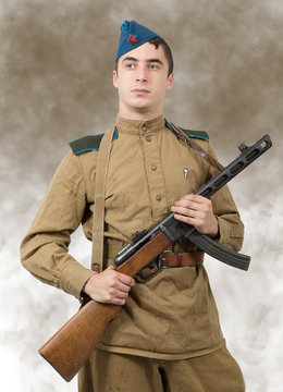 young Soviet soldier with machine gun, ww2