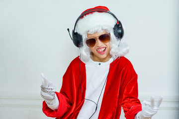 boy pretending he is a Bad Santa