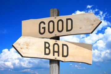 Good, bad - wooden signpost