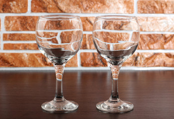Glass and bottle wine on wooden table