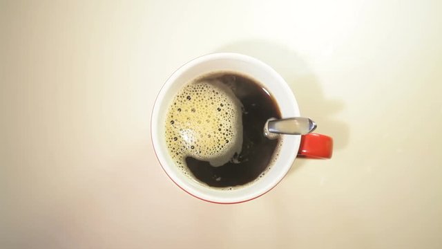 mug of hot coffee on the table