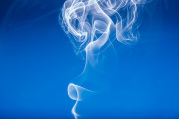 White smoke shape on a blue  backgrounds