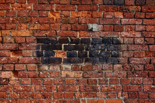 100 years old brick wall that gives you a great background © Roman