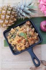 Pineapple curry with pork in pan delicious.