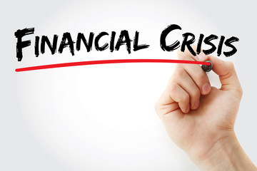 Hand writing Financial crisis with marker, concept background
