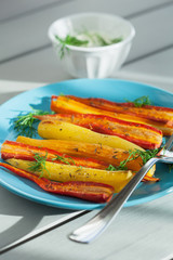 roasted colorful carrots on plate