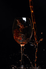 glass with red wine drops