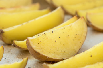 Baked potatoes with rosemary and spices