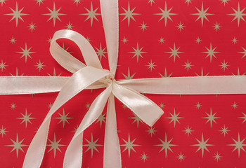 Ribbon on a red background.