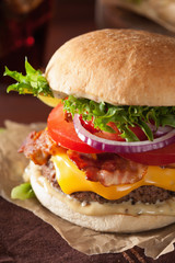 bacon cheese burger with beef patty tomato onion