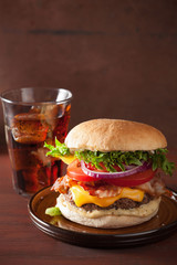 bacon cheese burger with beef patty tomato onion