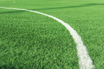 Obraz premium Line curve soccer field green grass background.