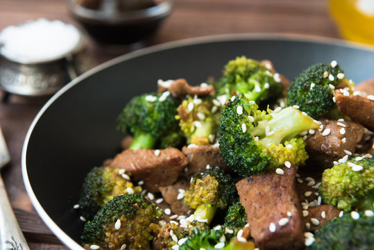 Fried broccoli and beef in pan