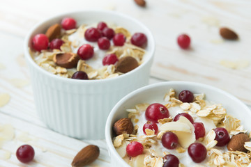 Fresh homemade yogurt with almond flakes