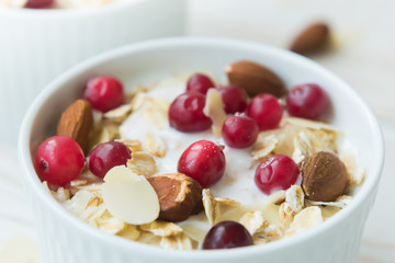 Fresh homemade yogurt with almond flakes